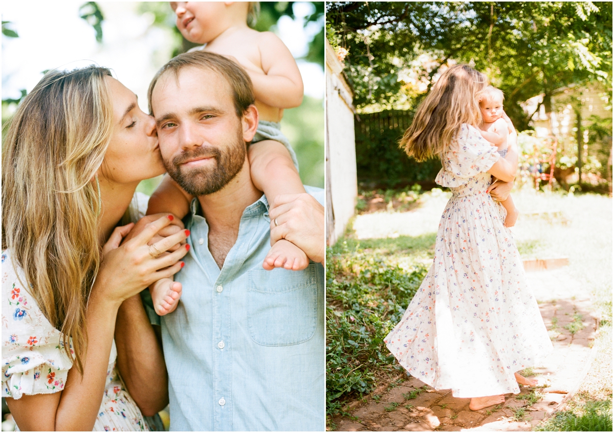 mom twirling with baby son and kissing dad